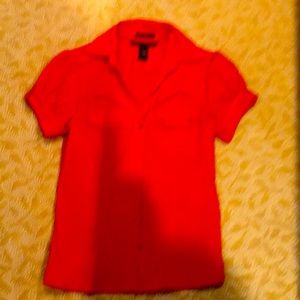 Woman’s red blouse